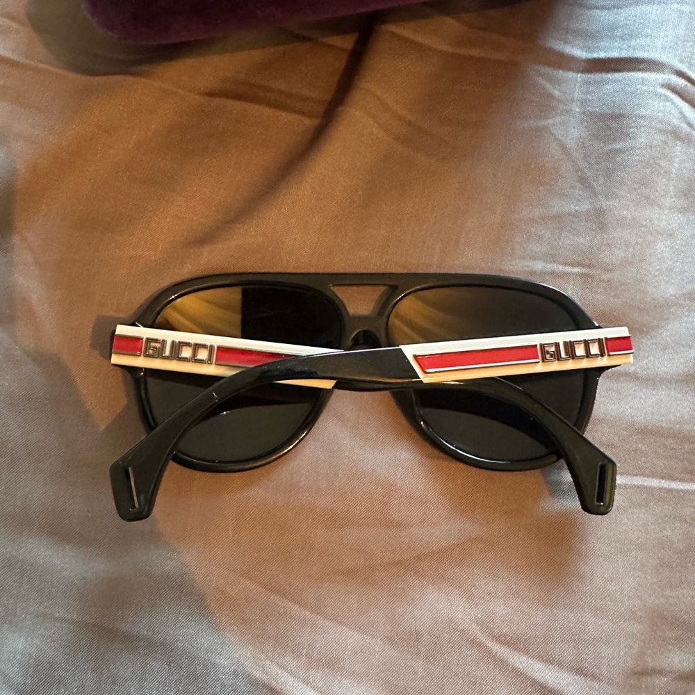 Gucci Black Sunglasses with Red Detail